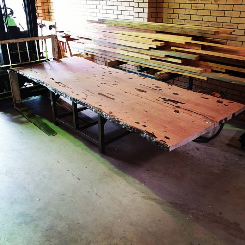 Large 3 metre x 1.2 meter Natural Edge Jarrah boardroom table underway. Looking forward to finishing this off and bringing you pics of the final product.

https://www.jarrimber.com.au/products/furniture-products/raw-edge/