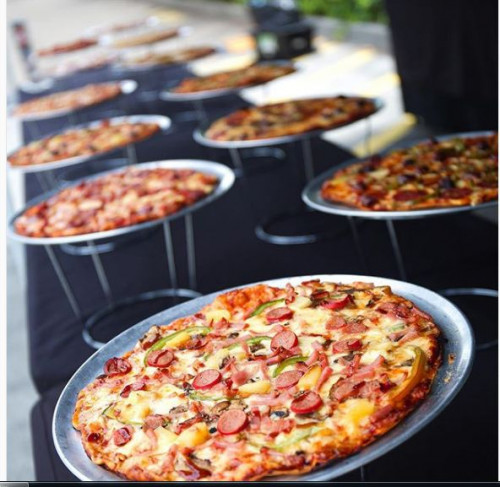 Our setup is professional, portable and unique. Have us cook and serve fresh pizzas in front of your guests so they can capture the full experience. Our signature delicious thin base and energetic service will combine to make your event amazing. Check us out
Visit Us:-https://www.thepizzaboys.com.au/