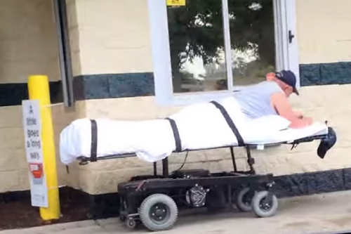 Man goes into McDonalds drive through on a stretcher Biggest Maccys fan ever