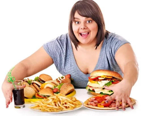 depositphotos 29032165 stock photo woman eating fast food