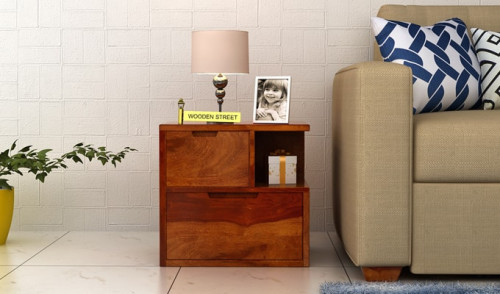 Check out the latest variants of solid wood bedside table designs online and pick the one complementing your decor or you can also get a customized design.
Visit: https://www.woodenstreet.com/bedside-table-design
