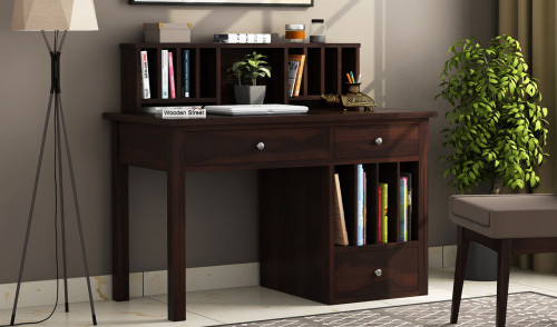 Explore the amazing collection of wooden study table in Bangalore online available in solid woods such as Mango and Sheesham and avail the special offer or get it customized as per your taste. Visit: https://www.woodenstreet.com/study-table-in-bangalore